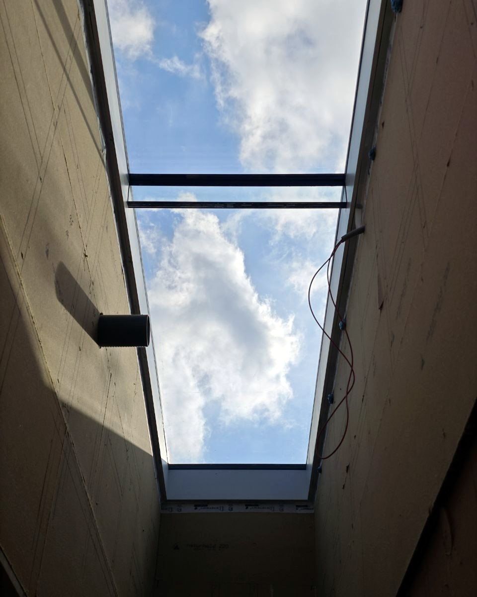 View from below through the unit to the sky, during construction