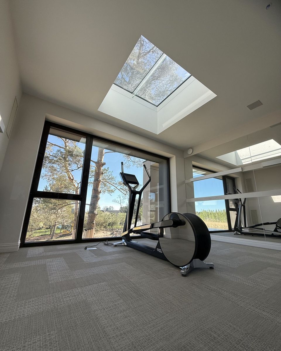 Home gym with a 2 by 2 metre rooflight over the training area